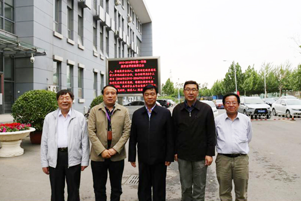 孙进院长与天津职业大学校长刘斌（左二）、原校长董刚（右二）等校领导合影